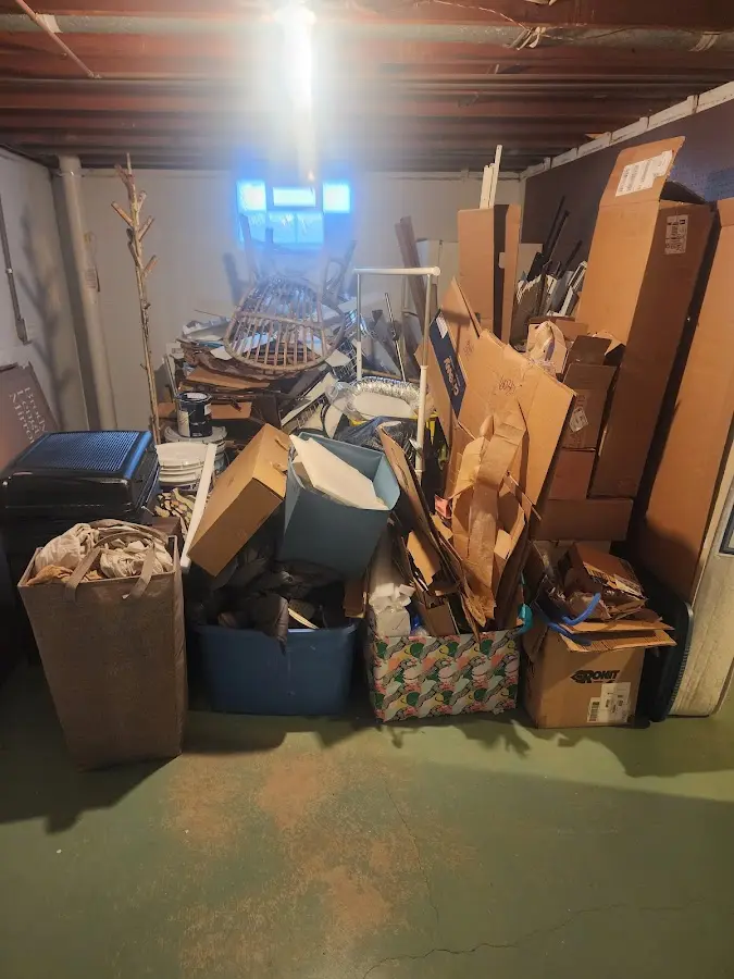 Roll-off dumpster container at job site for 15 Yard Dumpster Rental in Monroe